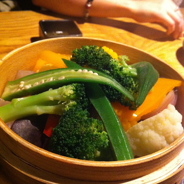 a close up of a bowl of food with broccoli