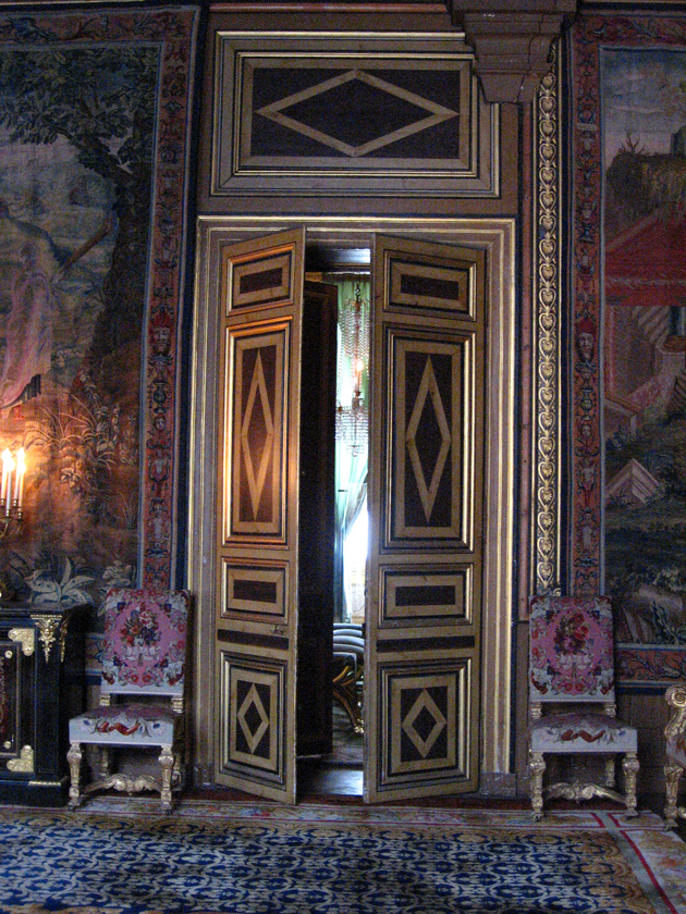 the door to the el room is large and ornate