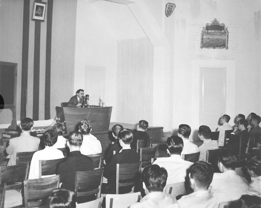 black and white pograph of a classroom full of students