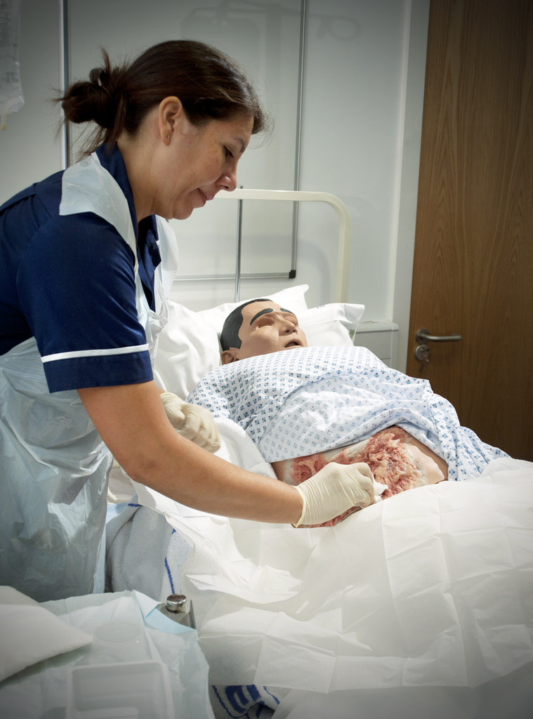 a doctor tending to an injured patient in a hospital