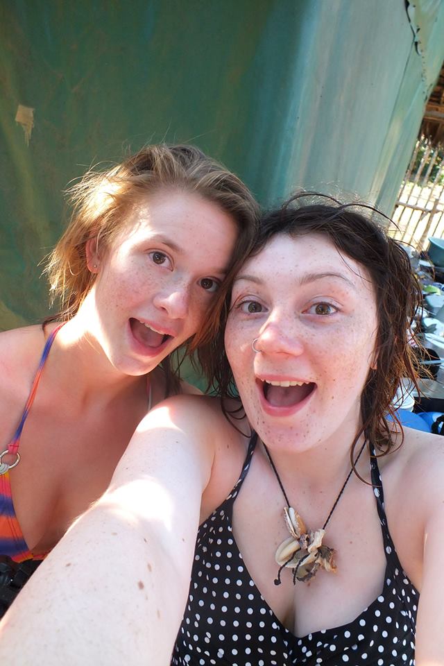 two women taking a selfie together in a boat