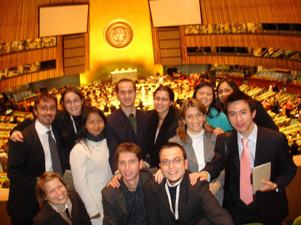 a group of young adults and s in suits