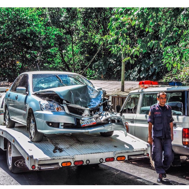 an ambulance car has been towed off of the street