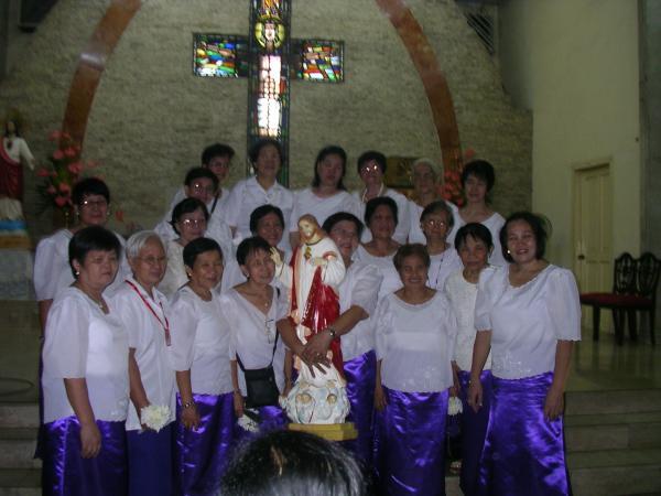 group pograph with religious figures and white shirts