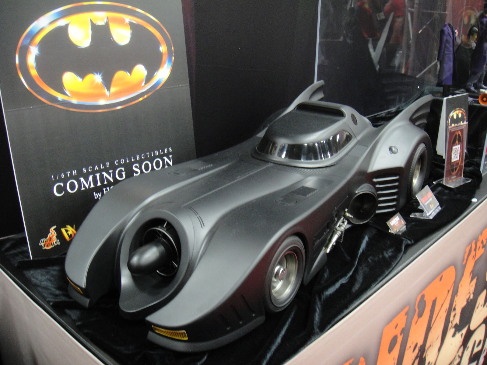 the batmobile is displayed at an event