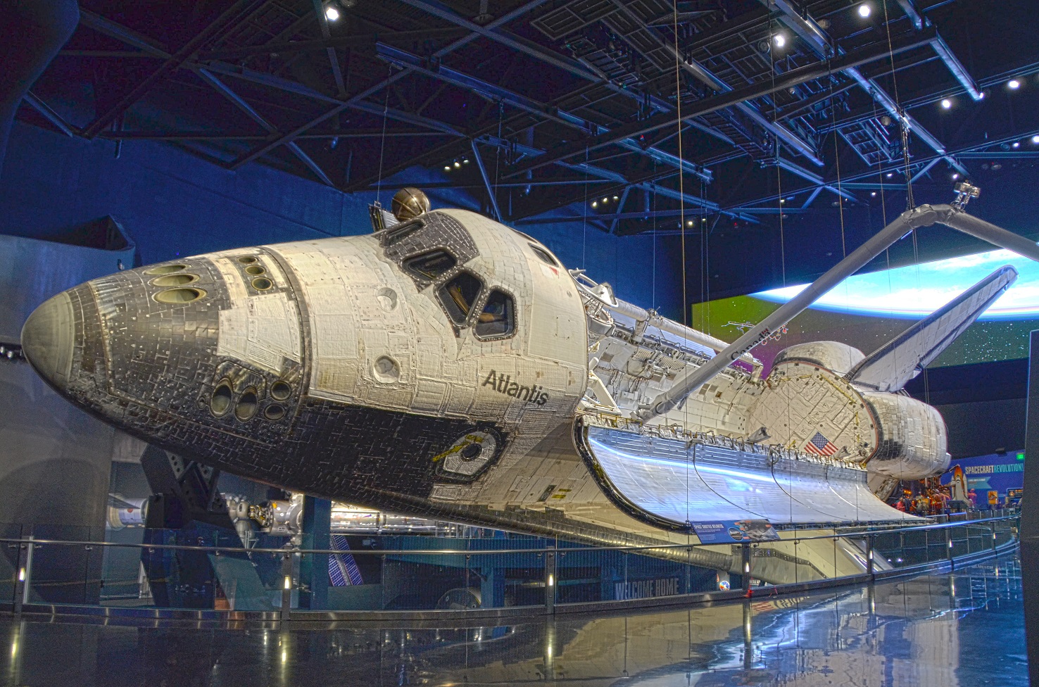 an old fashioned space shuttle on display in a museum