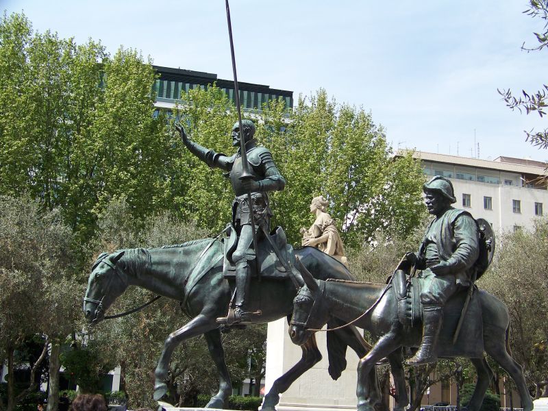 statue of military officer with mounted rider in outdoor setting