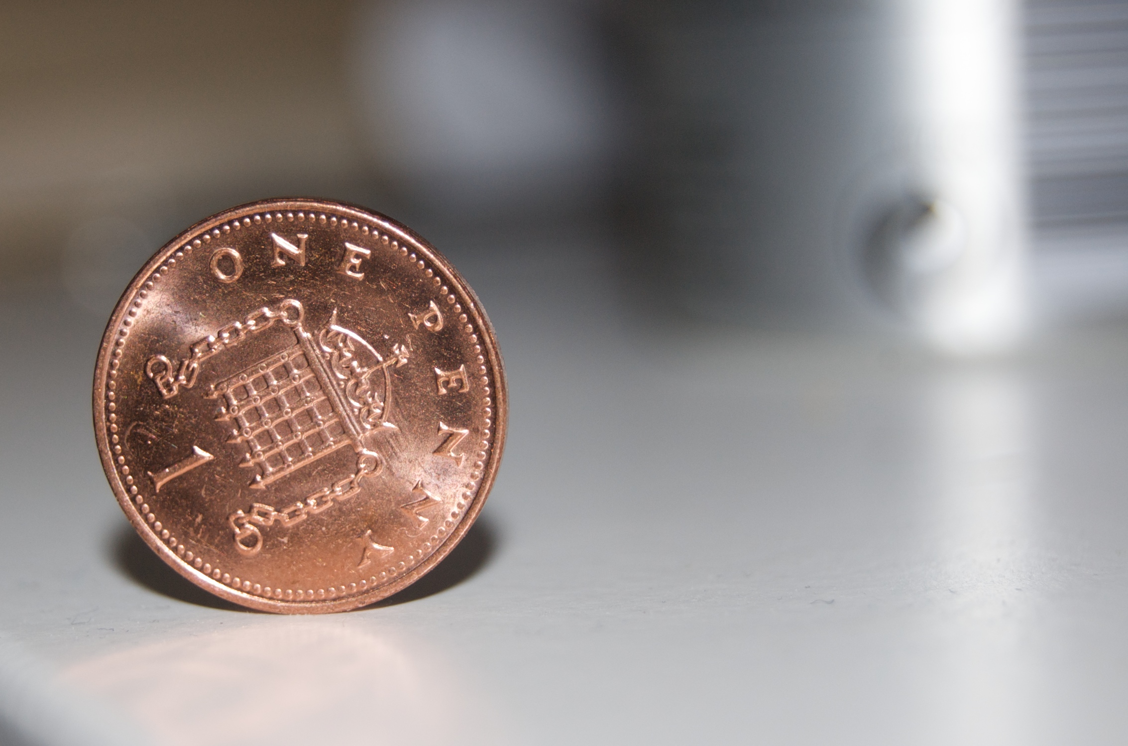 a mexican coin is laying on a counter top