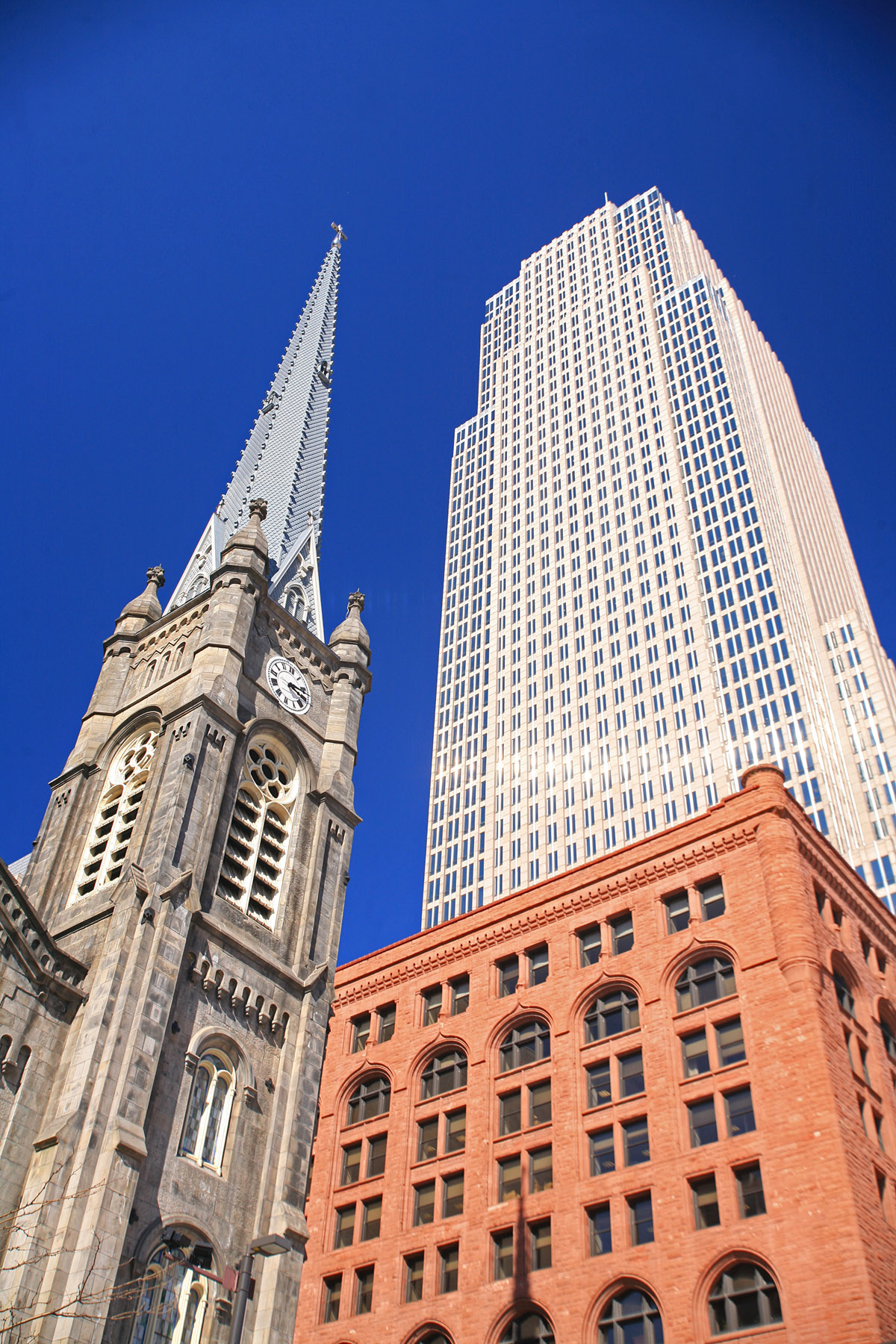 tall buildings in the background of a blue sky