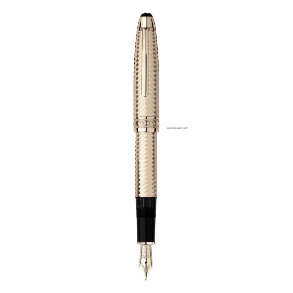a golden pen with black and white trim