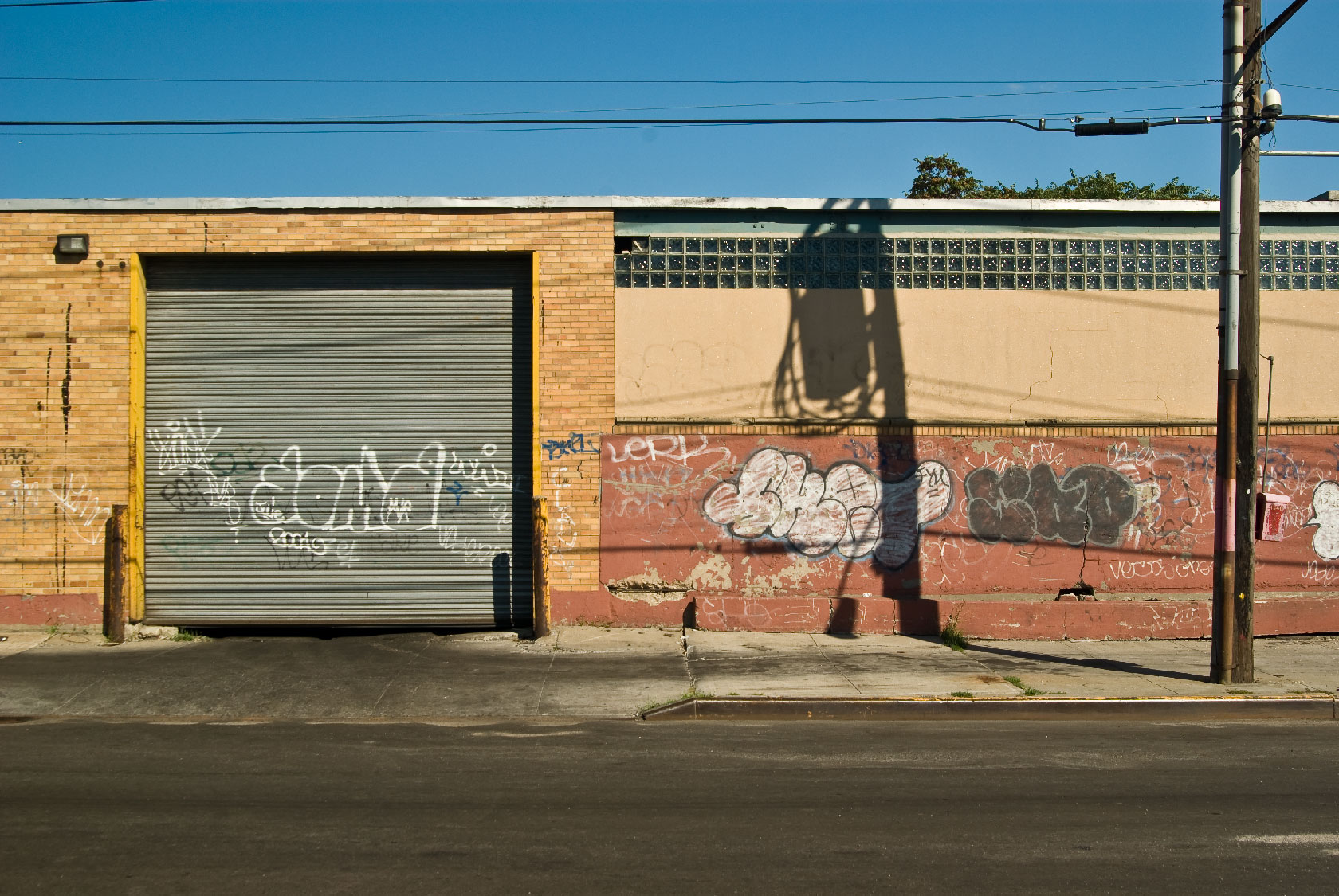 an image of a street view with some graffiti