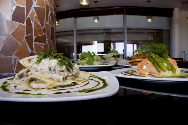 plates of food are in front of a wall