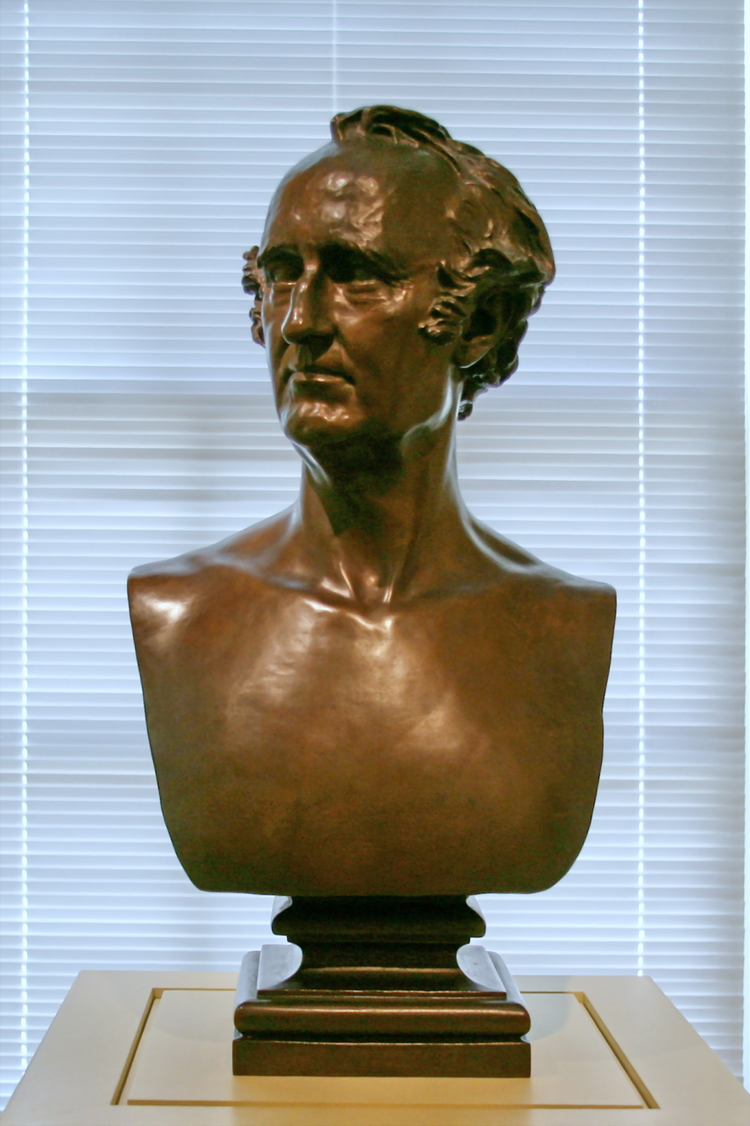 there is a close up view of a bust of an old man