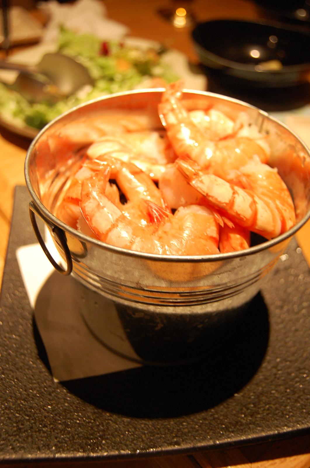 a close up of food in a metal bowl