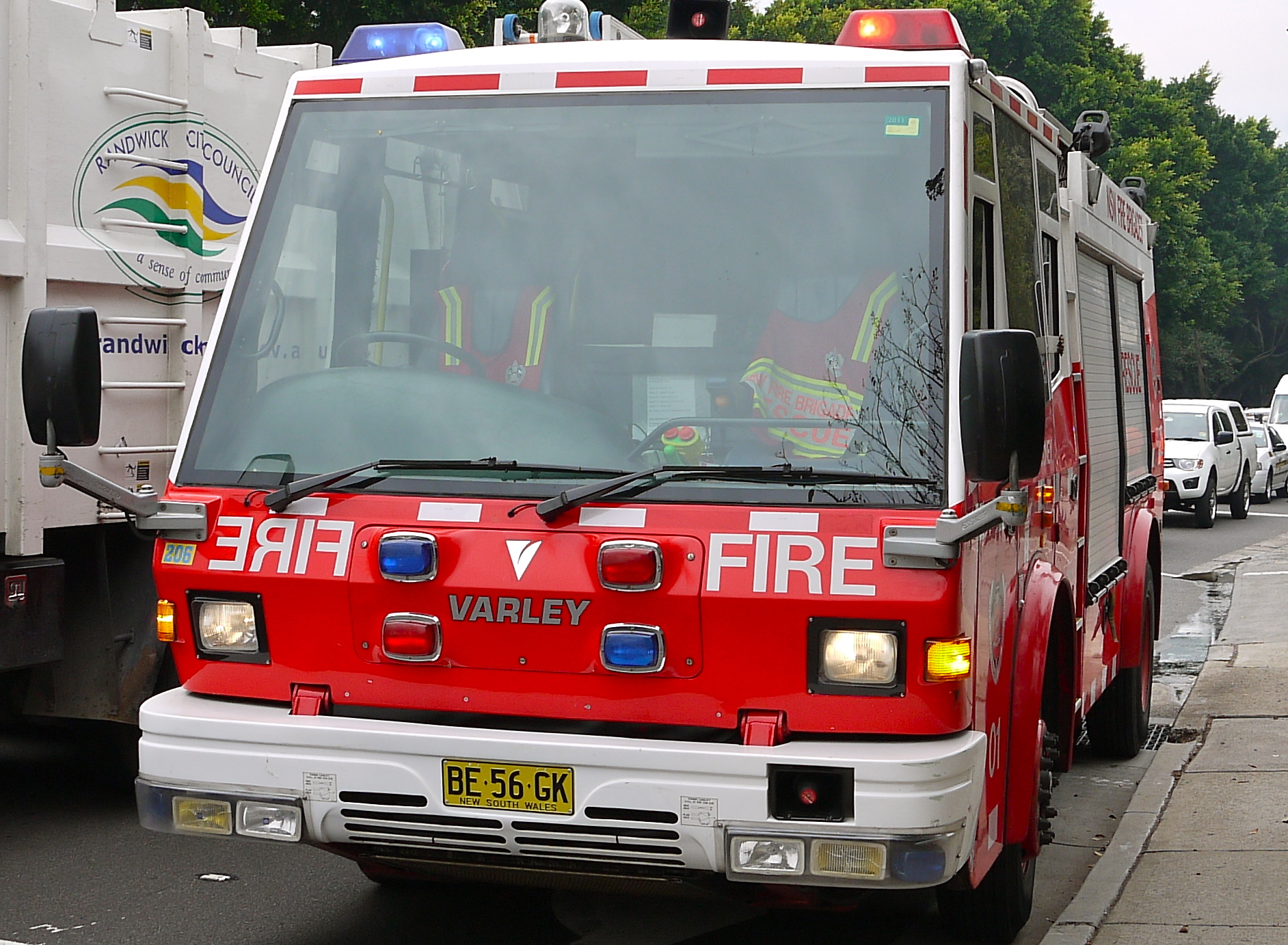 the red fire truck has emergency lights on it