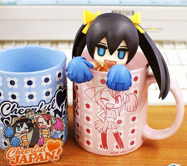 a mug with an image of a chibi kawaia doll in it