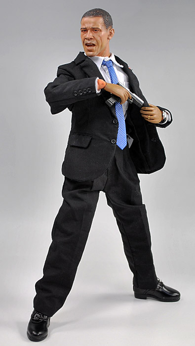 a close up of a figurine of a man in a suit and tie