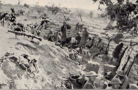 soldiers and their horses going through the trench