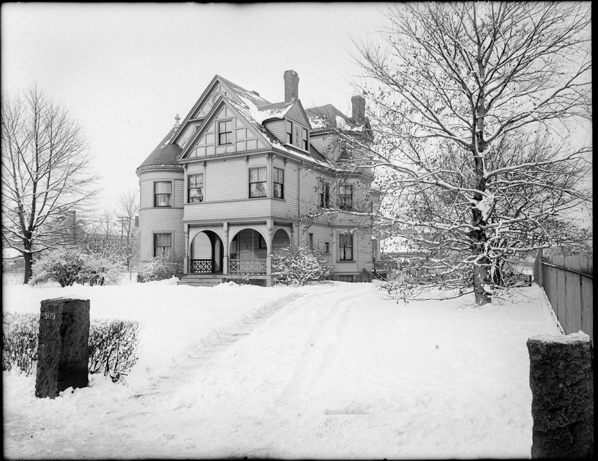 a black and white po of a large house