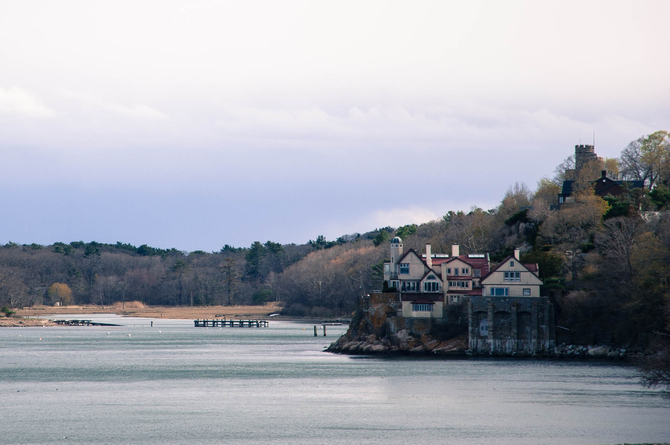 houses on the edge of a body of water