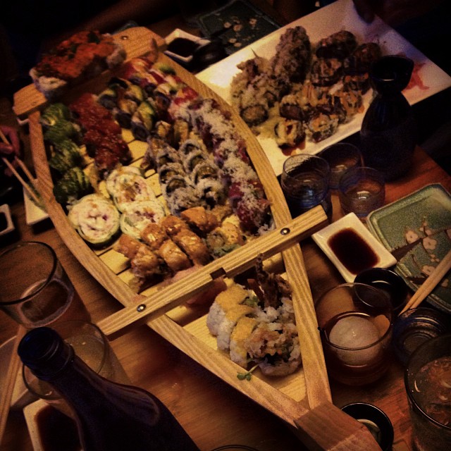some trays of food are sitting on a table