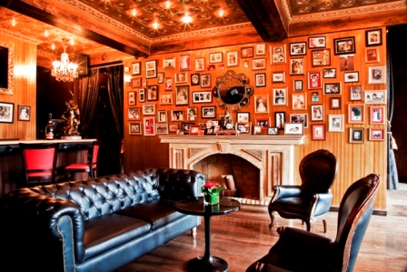 a view of a living room with an ornate wall