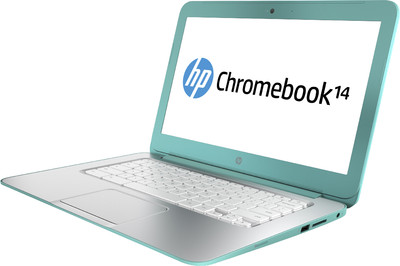 an hp laptop displaying the logo as it sits open