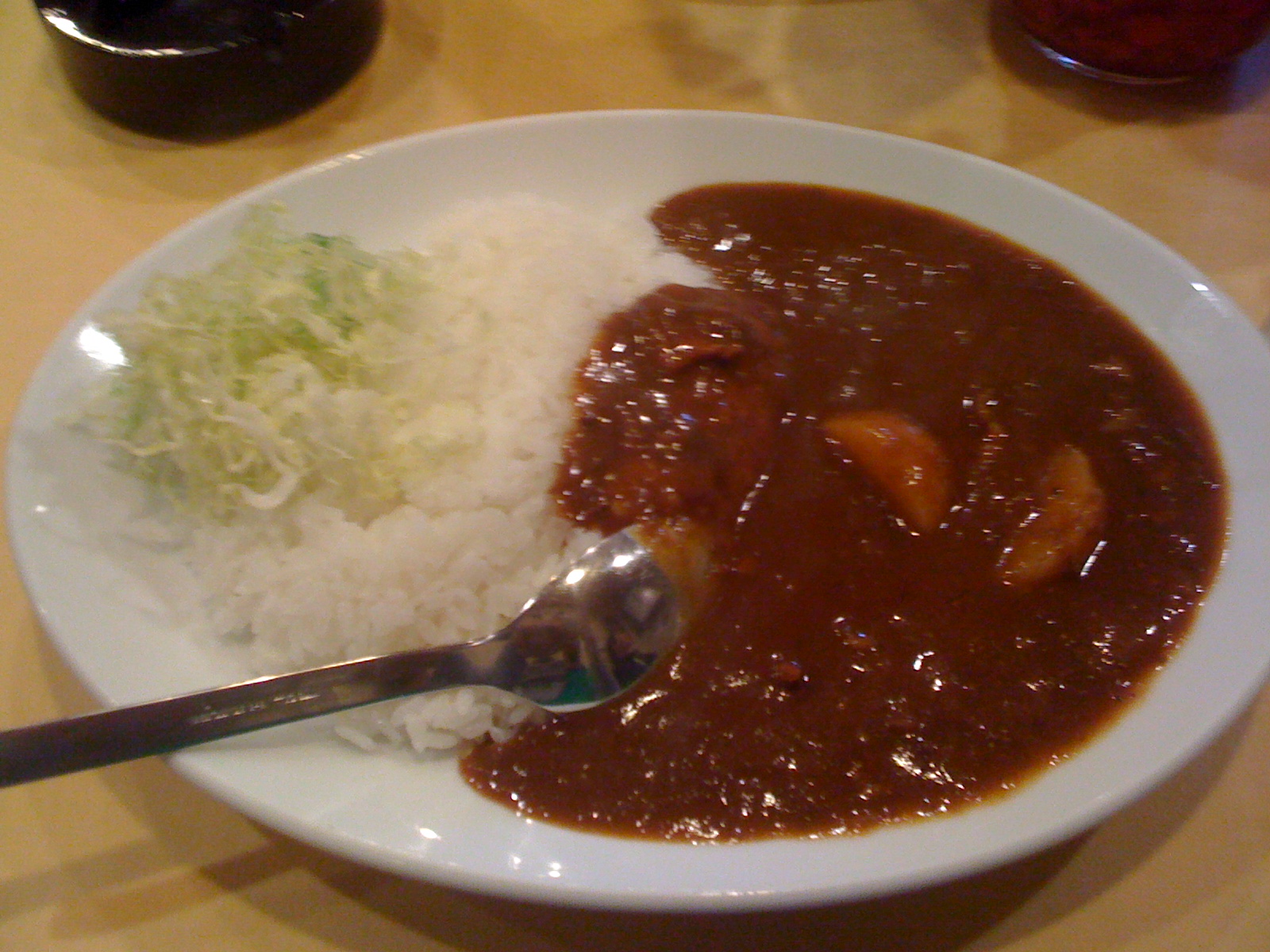 rice, beef and cole slaw in a bowl