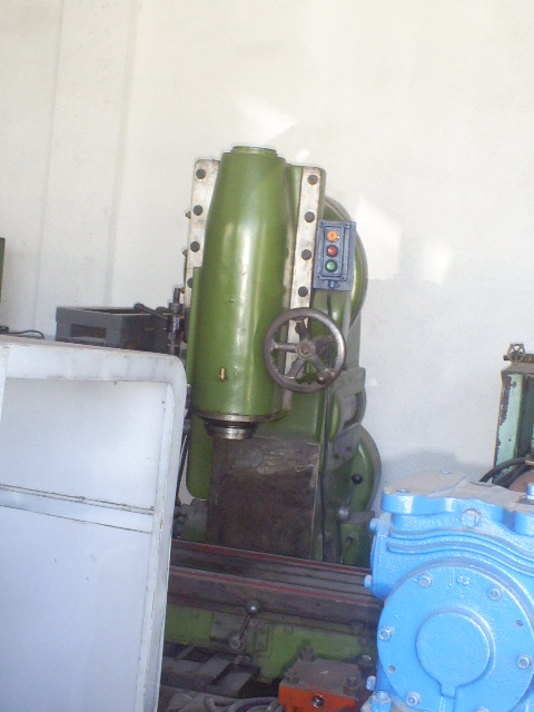 an industrial machinery with two valves and a hose