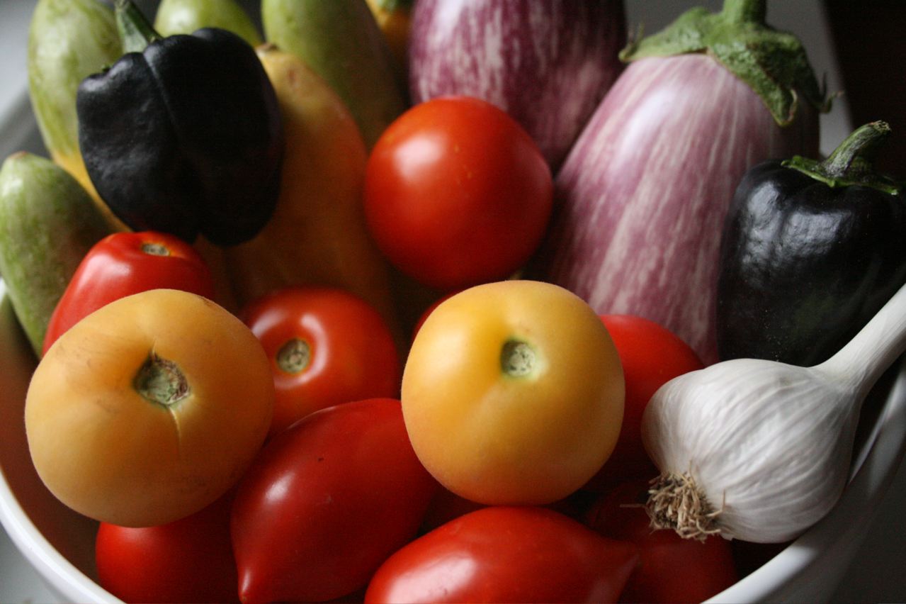 a bowl filled with assorted types of vegetables