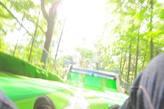 a man riding a skateboard on top of a slide
