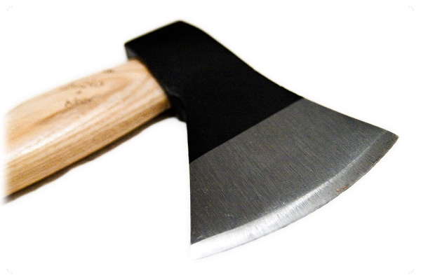 the front end of a large black and wooden knife