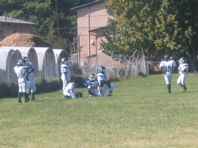 the small football team is playing their first game of their lives