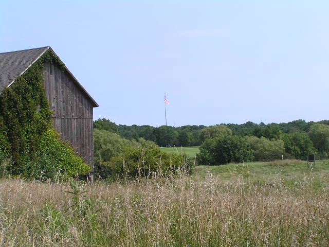 the old barn has a steeple on top