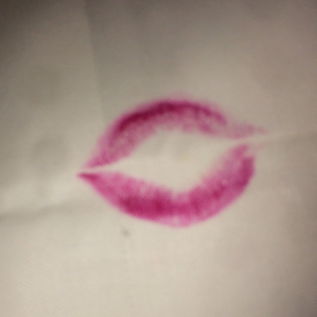 a close up image of a lipstick smooch