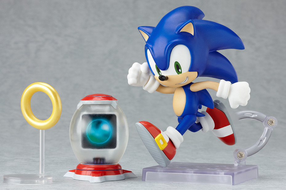 a sonic figure in action next to a camera