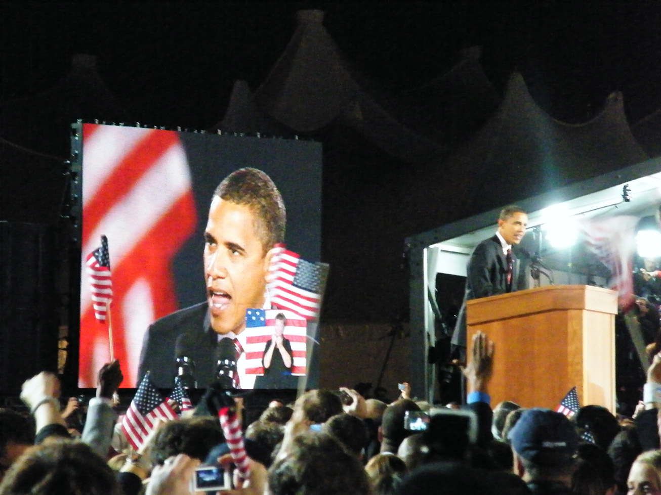 the president and republican barack obama speaking in front of people