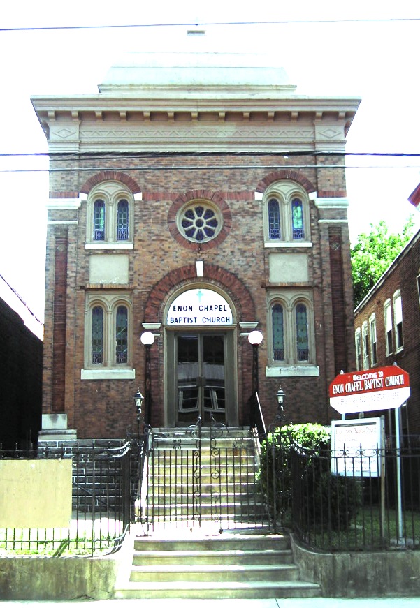 this is the front entrance of an old brick church