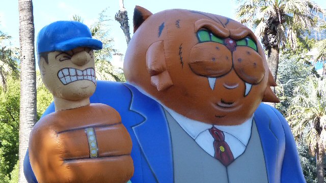 a couple of statues that are made to look like the characters from cartoon characters