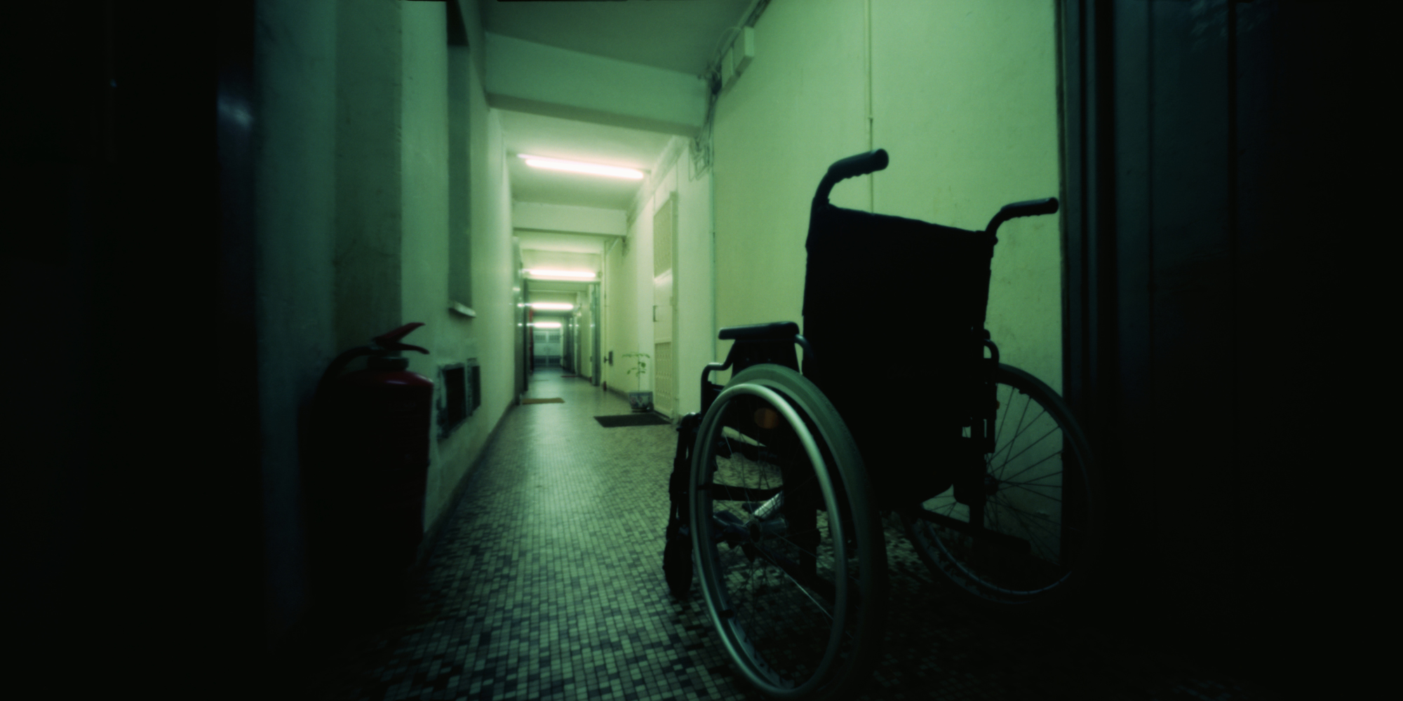 a handicapped person in an elevator looking for soing