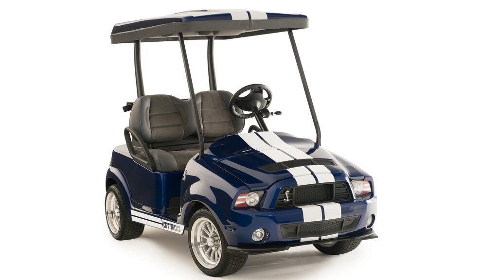 a blue and white four person golf cart