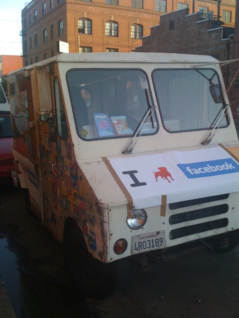 an old truck that says, food truck on the side