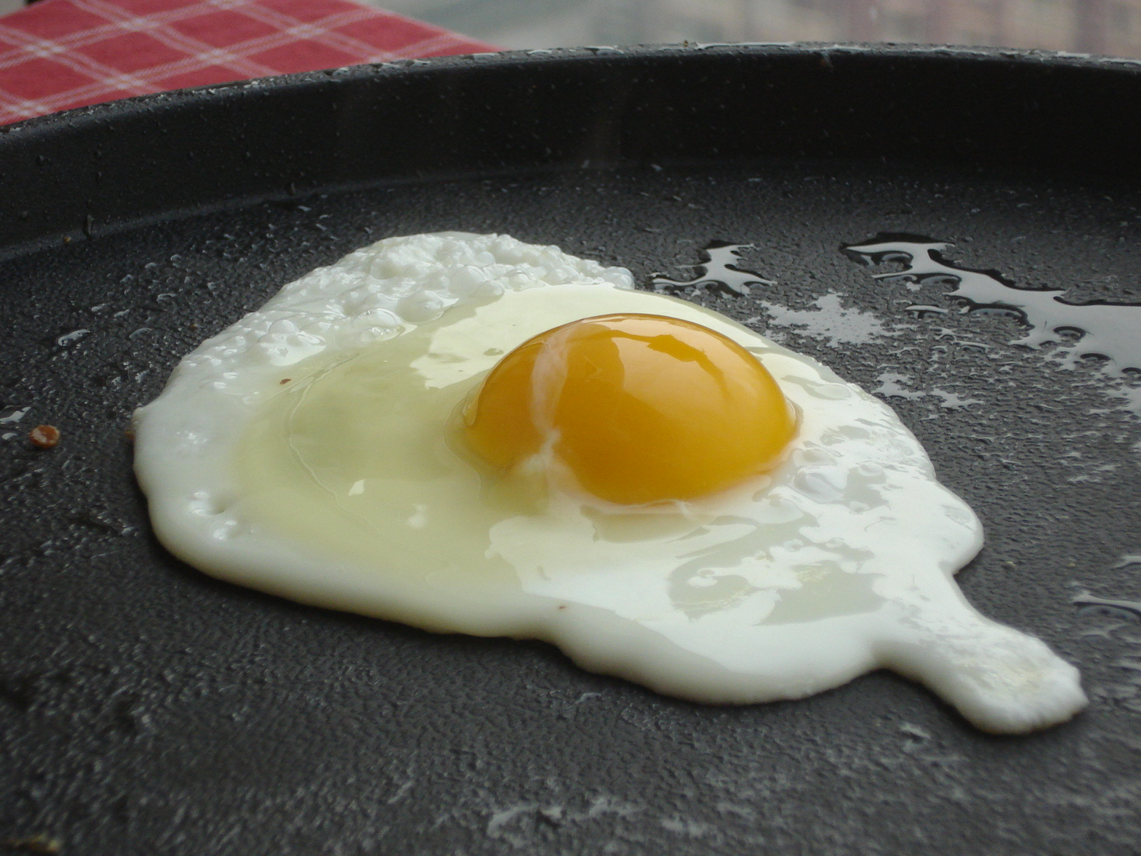 an egg with a white yolk and one in the middle