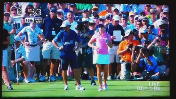 a television shows a group of women playing golf