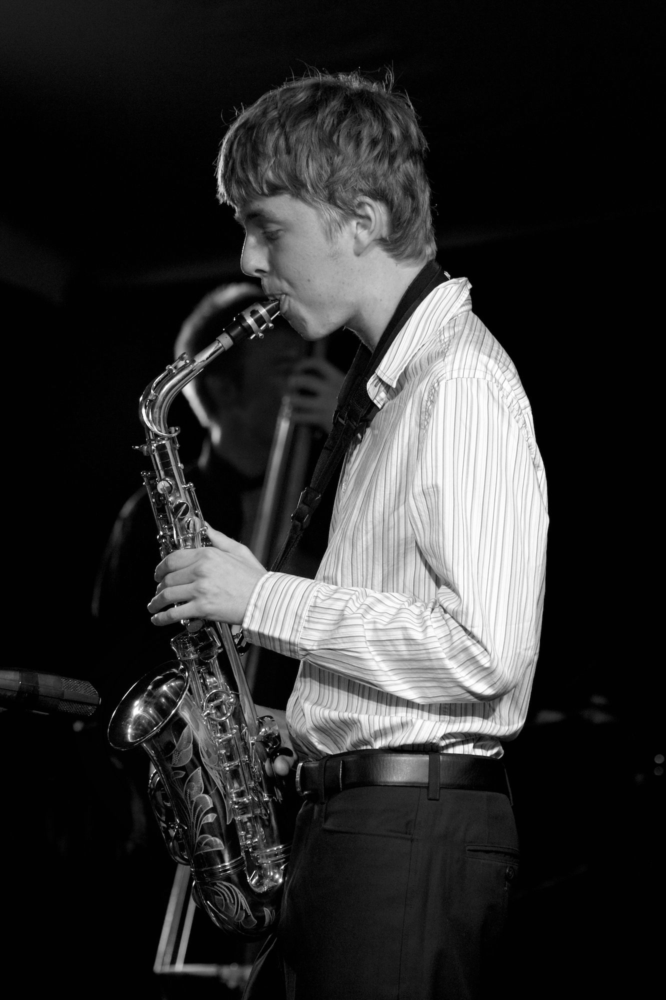 a man with a saxophone in his hands