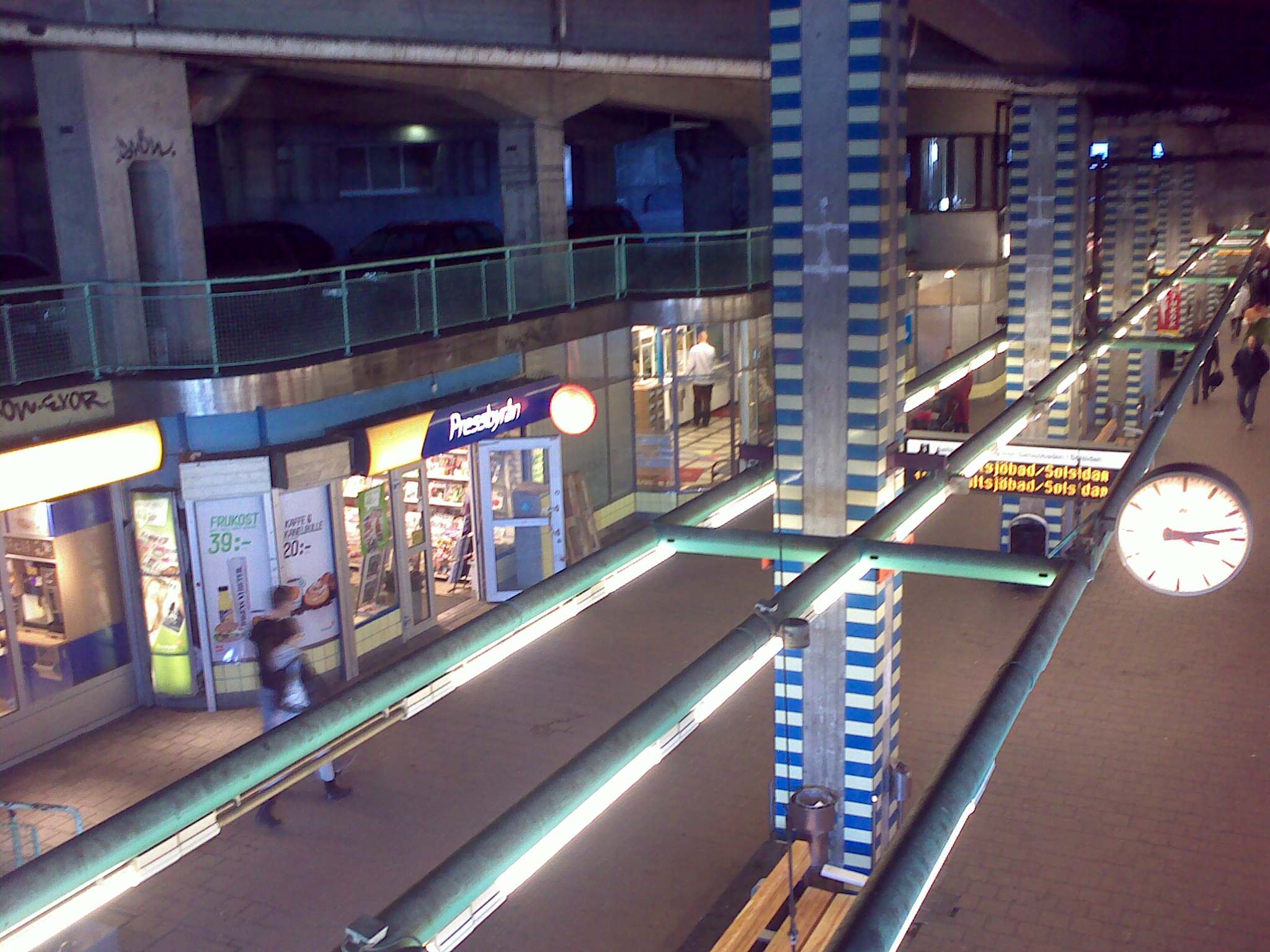 an overhead view of a mall building with various store fronts