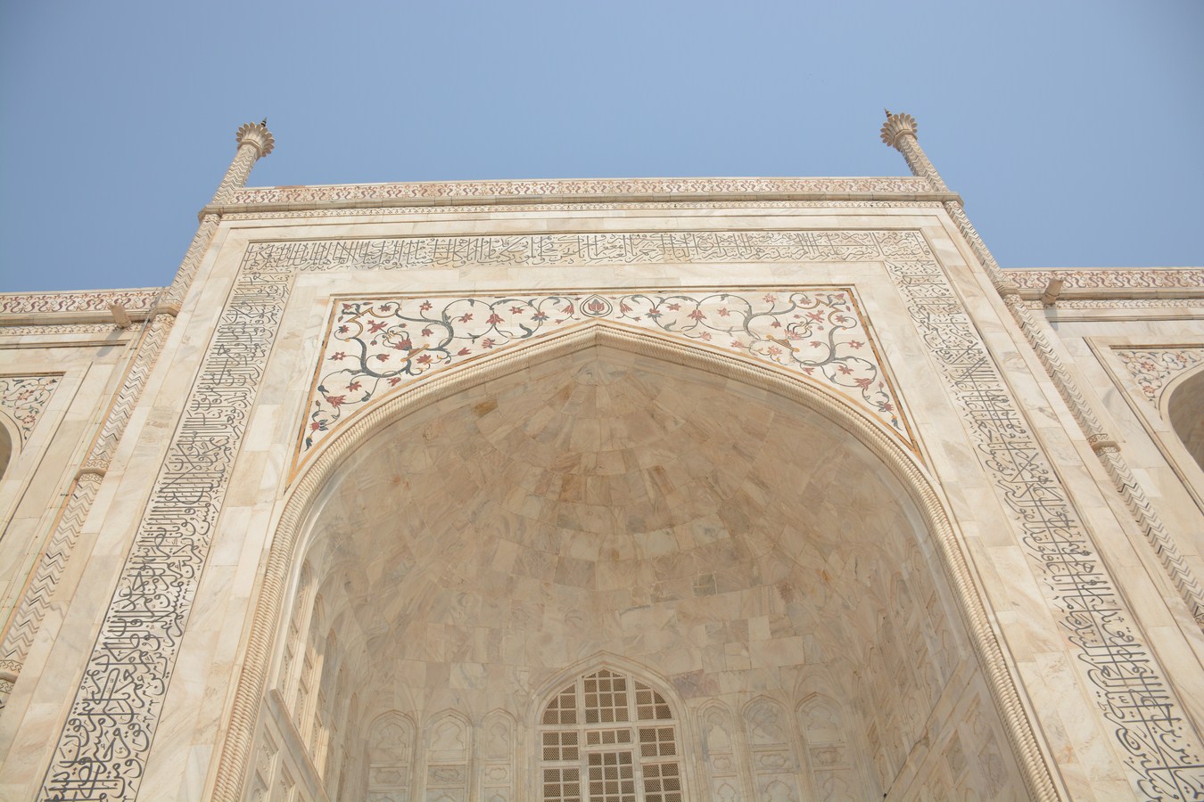 some white marble and ornate carvings on a building