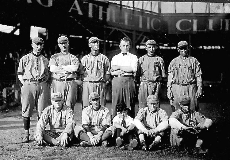 an old black and white picture of baseball players