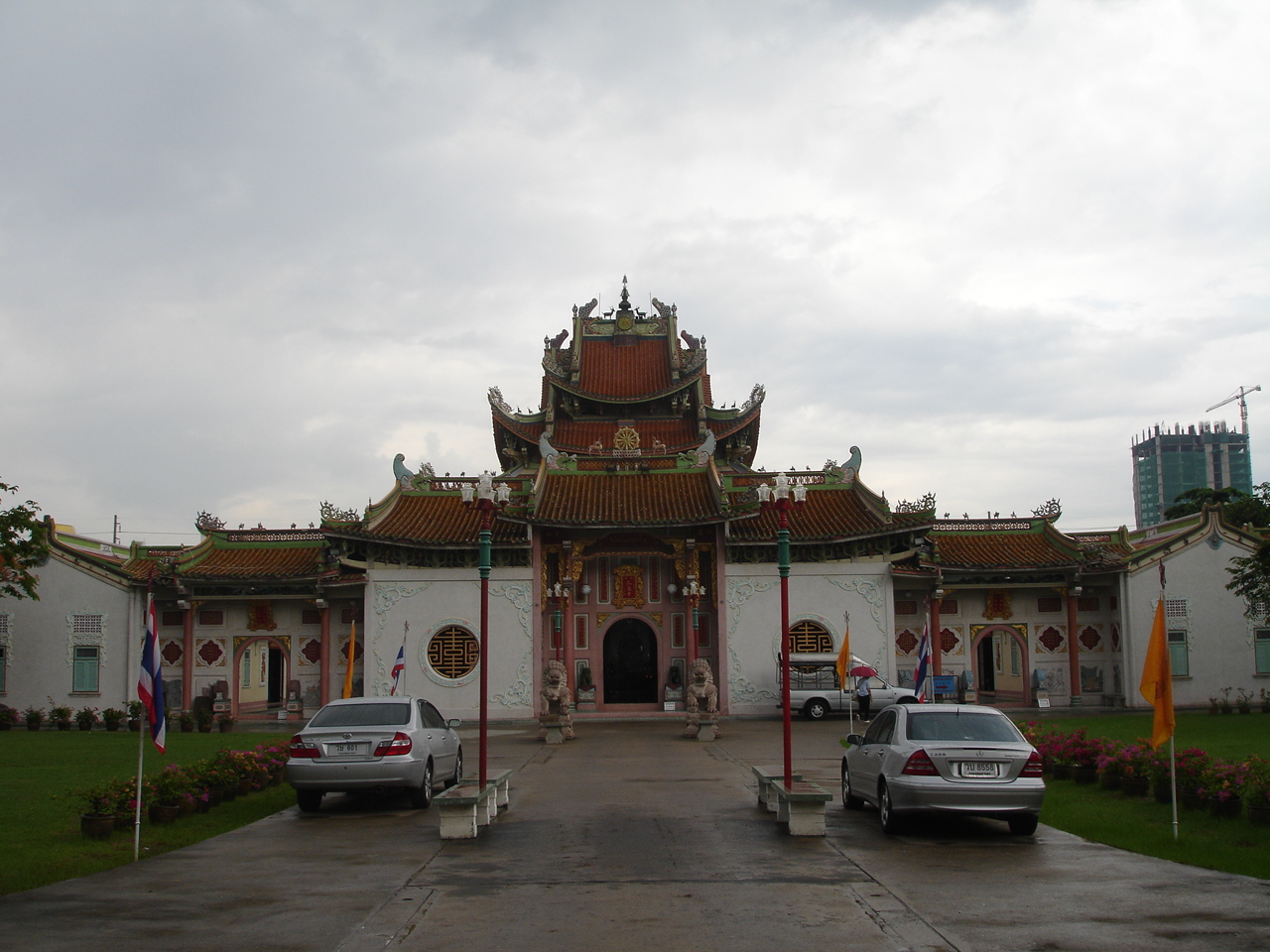 the large building with the pagoda on it is made of stucco