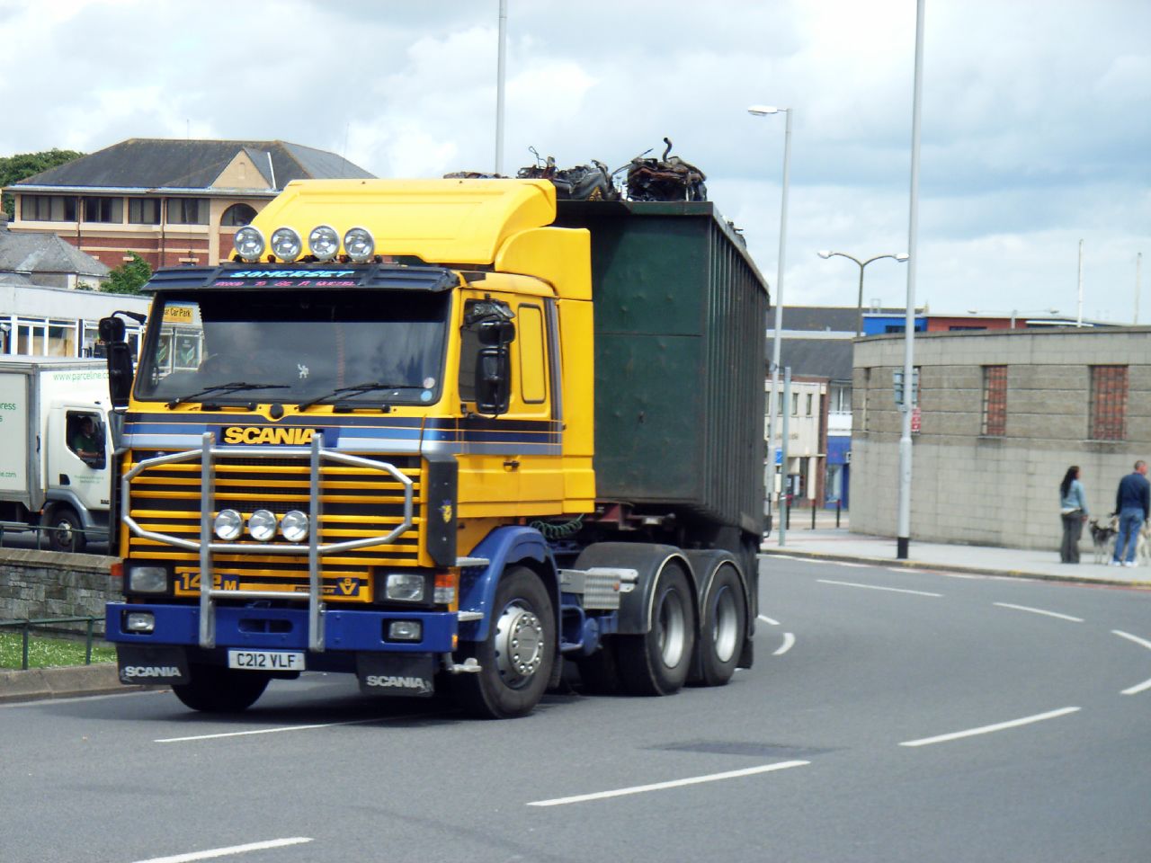 a large semi truck traveling down a road